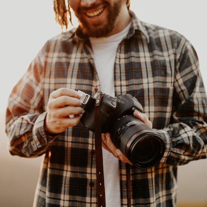 man holding camera