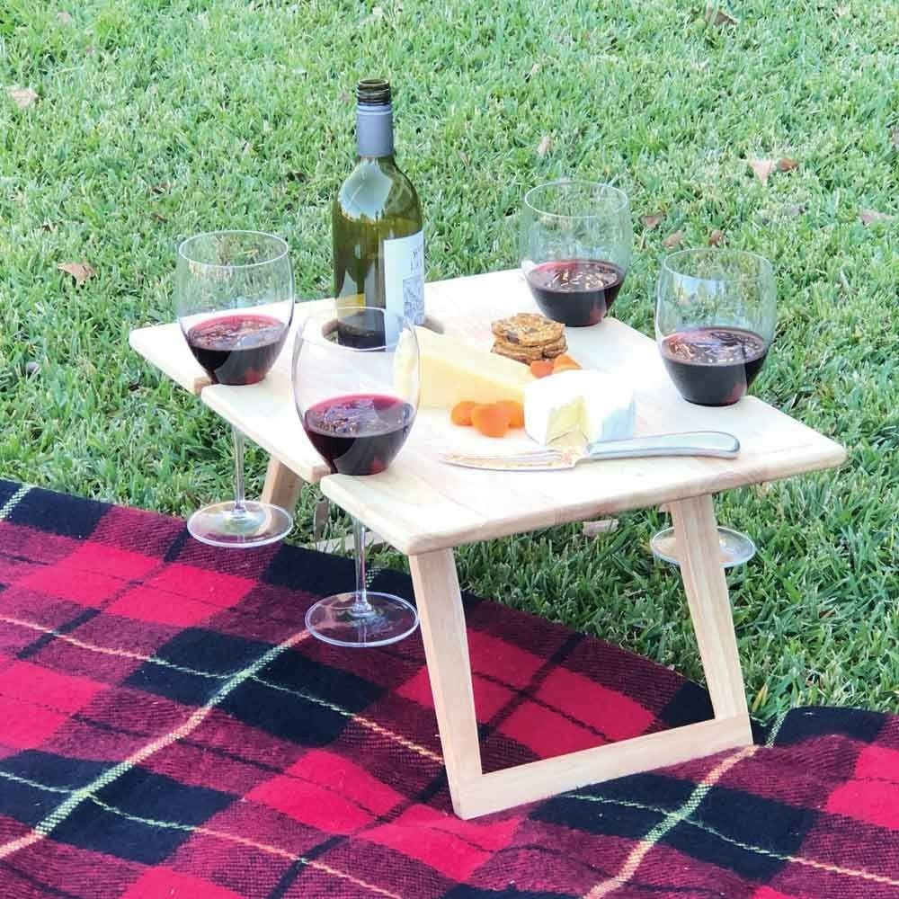 Stanley Rogers Picnic Table set up outside with wine glasses, fruit, wine bottle 