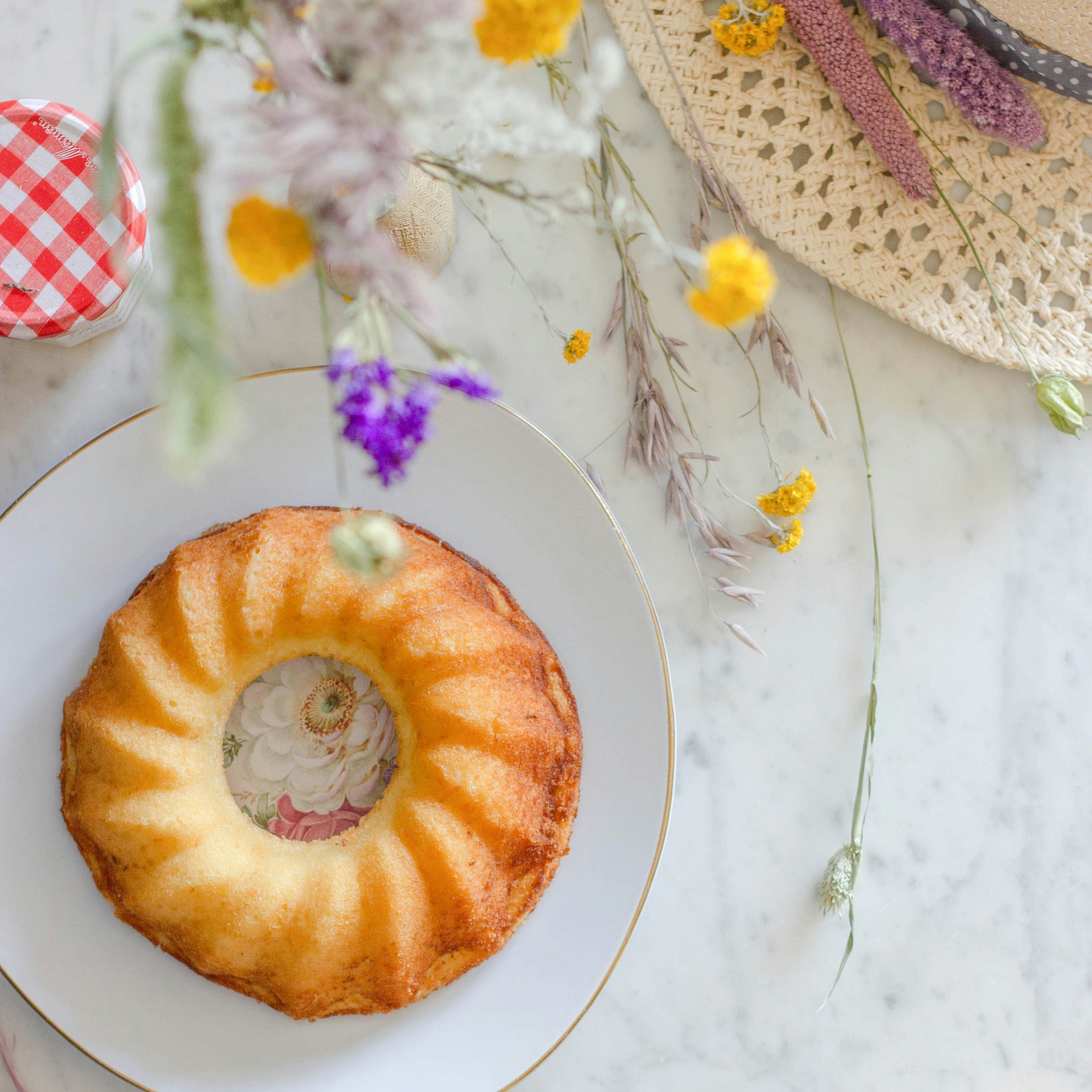 Bundt cake on plate with flowers