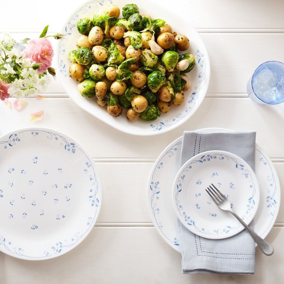 Corelle dinnerware with a potato salad on a Corelle platter