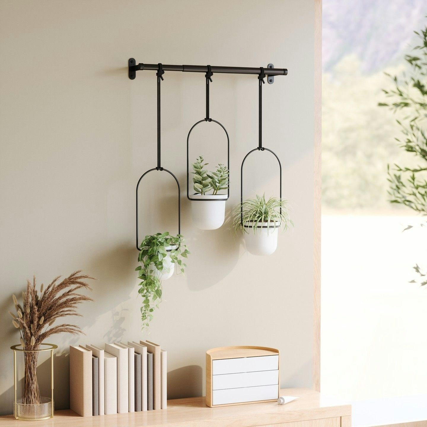 hanging planter pots with home decor on sideboard