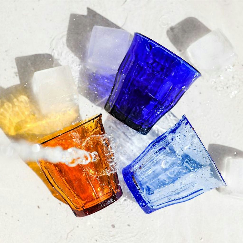 Duralex Picardie Tumblers lying down on a table with scattered ice