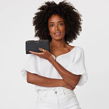Woman posing with the Saben Sam Wallet